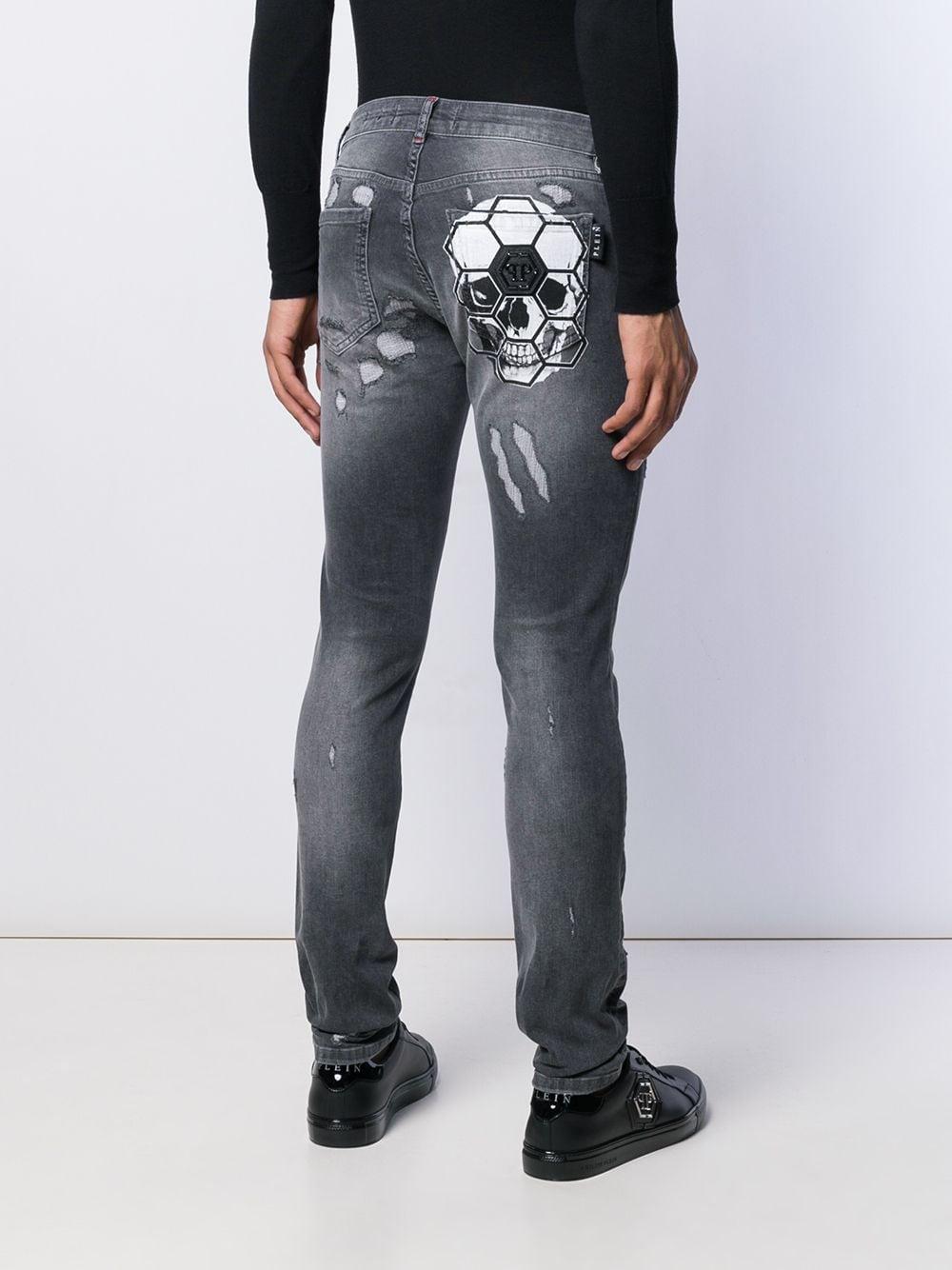 Jean tete de mort marque sale