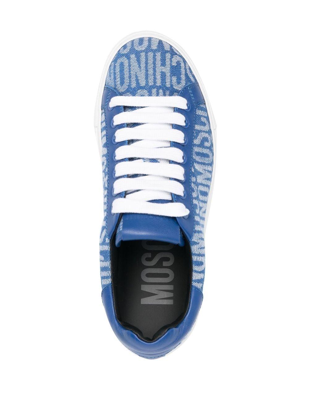 https://cdna.lystit.com/photos/farfetch/491c6cfb/moschino-blue-Logo-pattern-Low-top-Sneakers.jpeg
