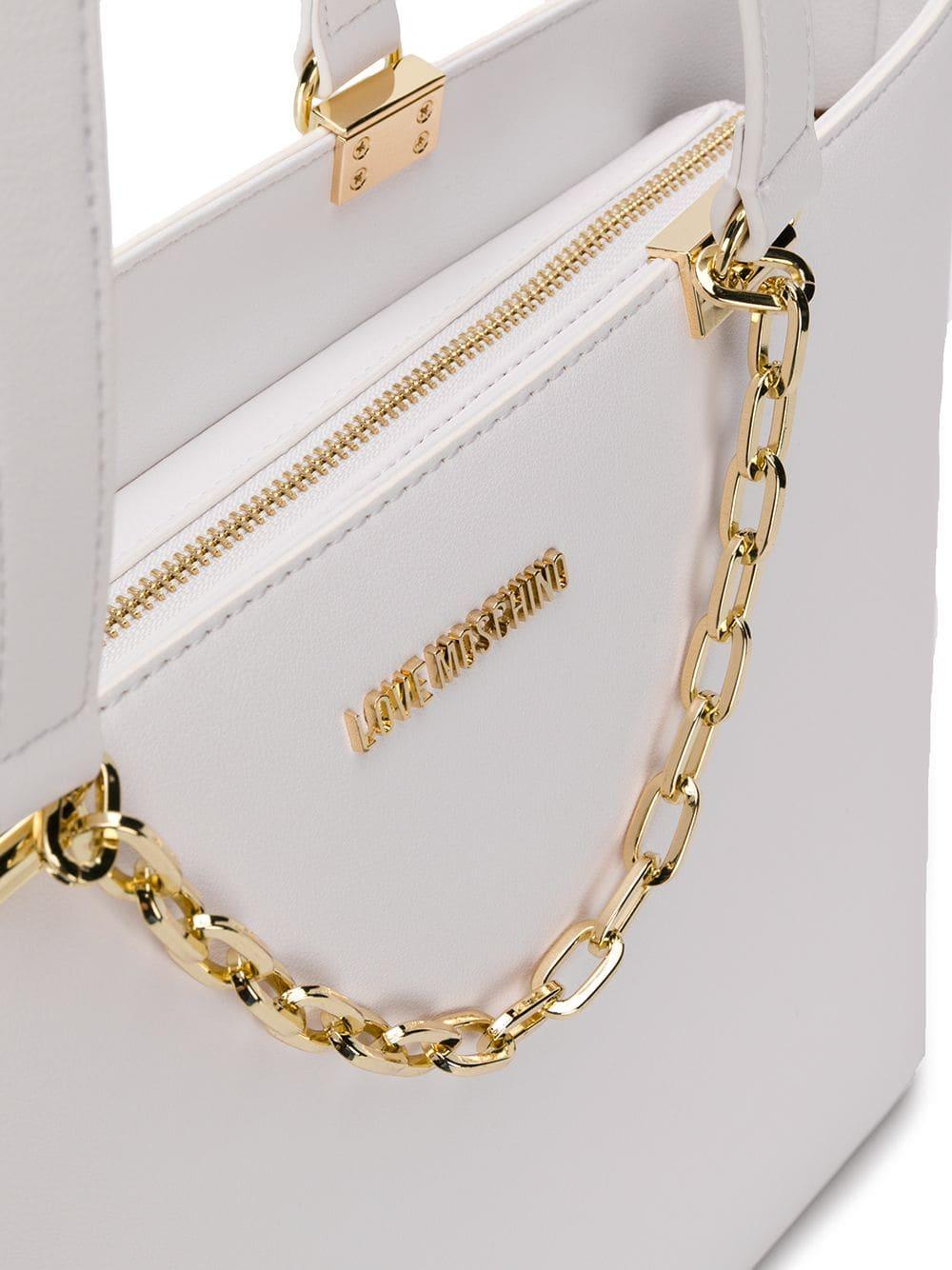 white and gold tote bag