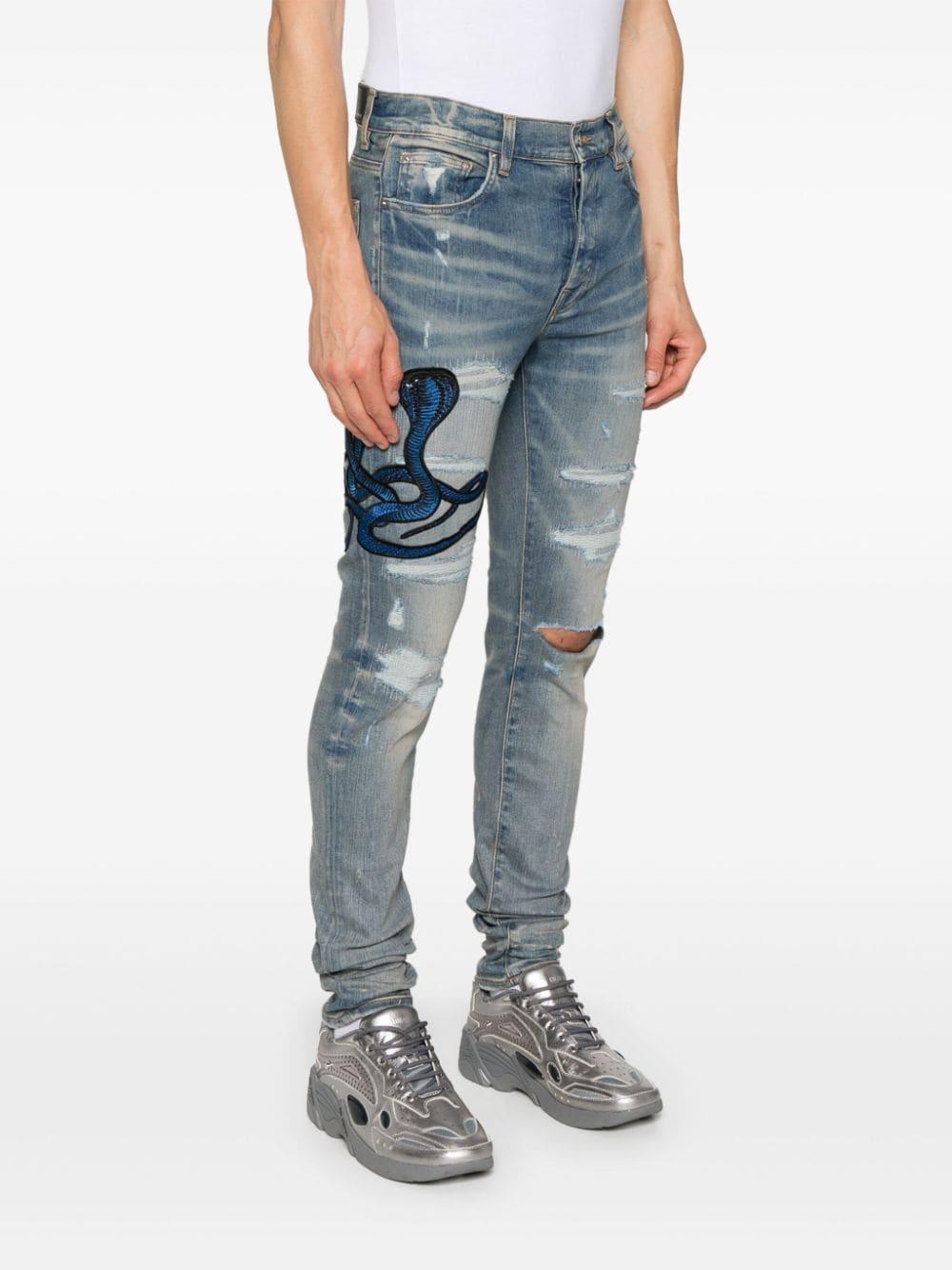 Amiri Patch-Detail Jeans in Blue for Men Lyst