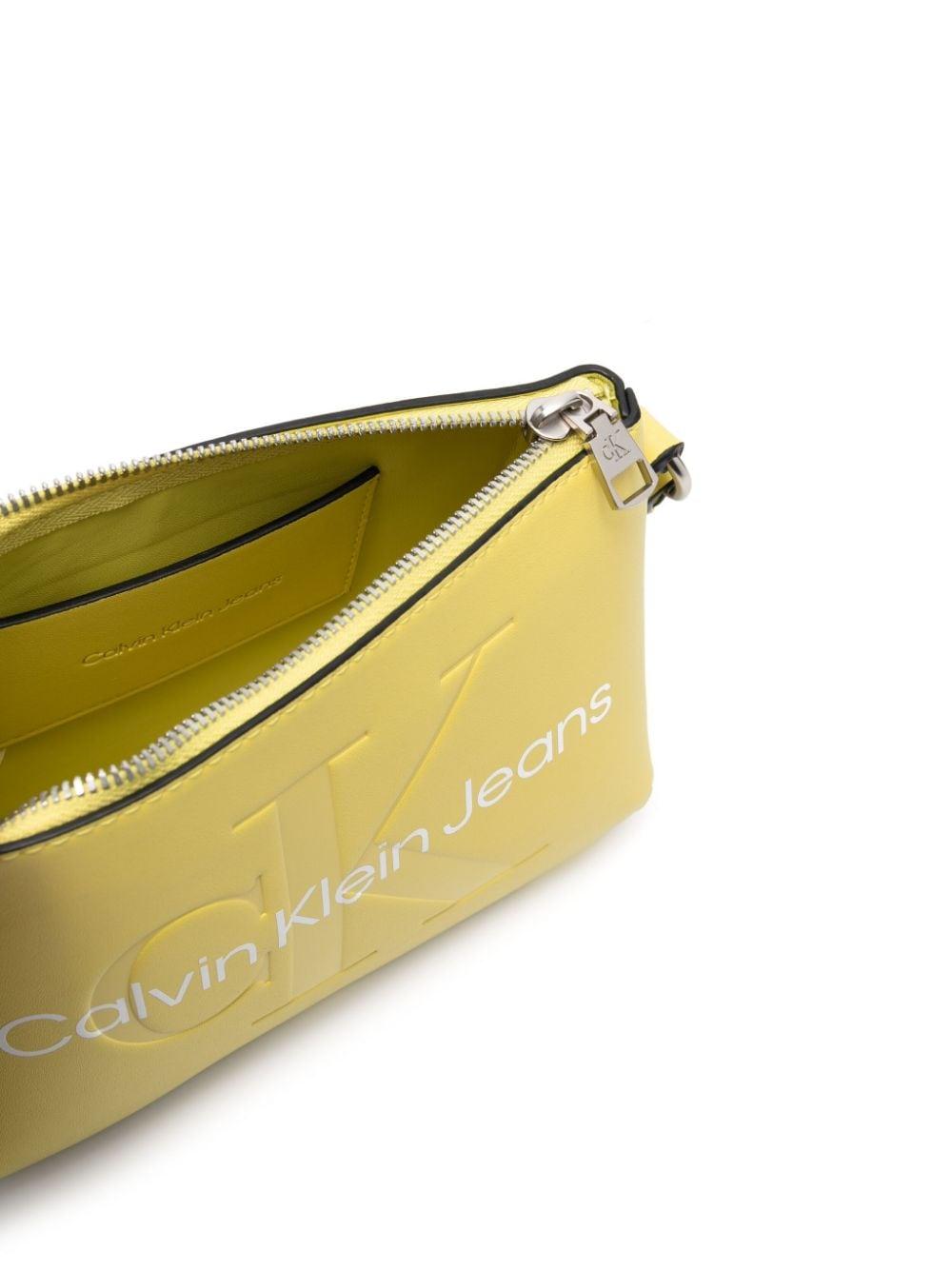 Calvin Klein Embossed-logo Faux-leather Crossbody Bag in Yellow | Lyst