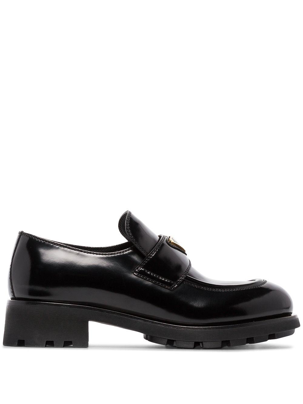 Prada Leather Chunky Logo Plaque Loafers in Black | Lyst