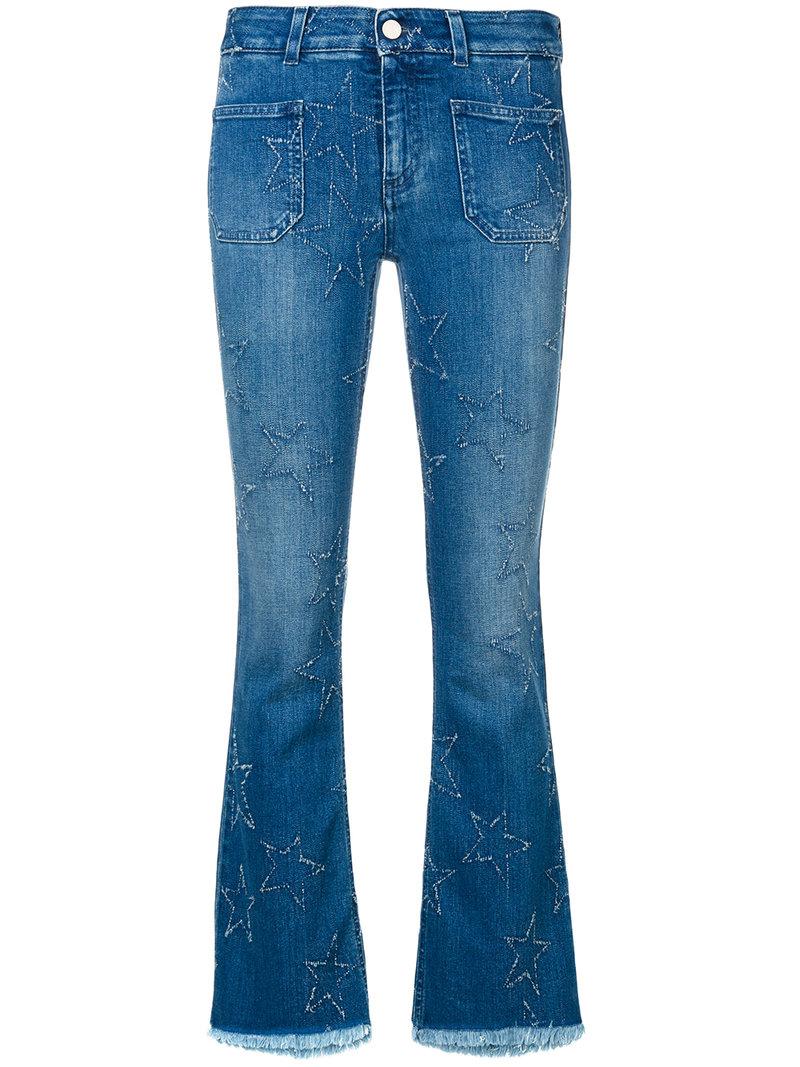 Lyst - Stella Mccartney Star Patch Kick Flare Jeans in Blue