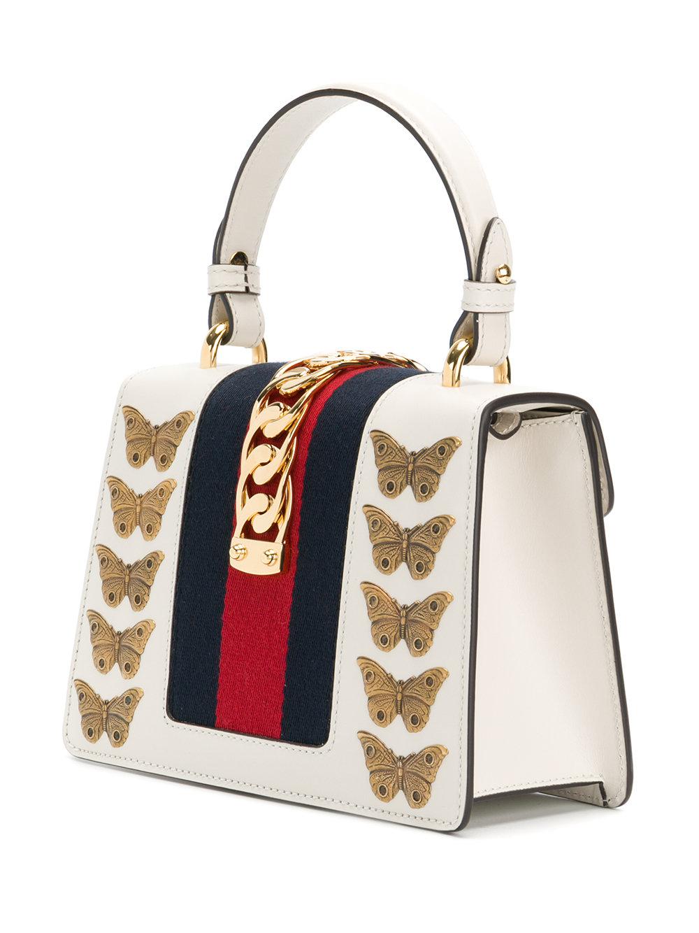 Tremble Fyrretræ fond Gucci Sylvie Gold Bug Bag in White | Lyst