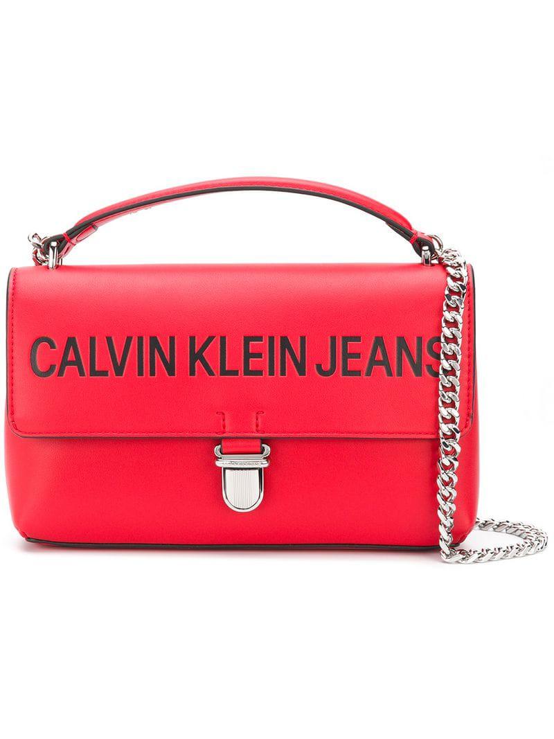 Calvin Klein Denim Sculpted Flap Shoulder Bag in Red | Lyst
