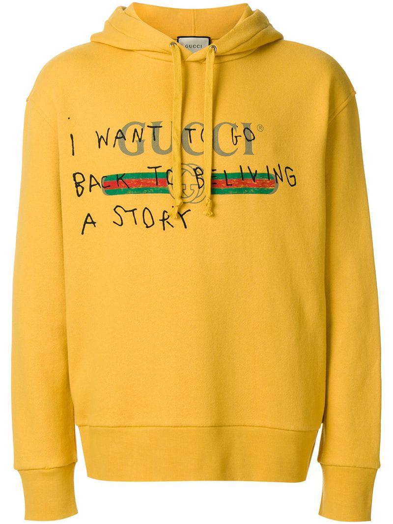 yellow gucci hoodie with writing