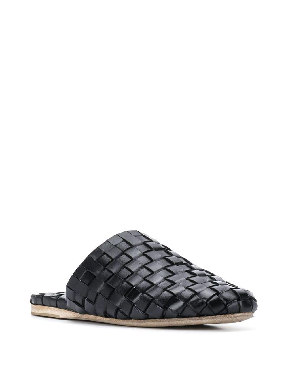 black woven mules