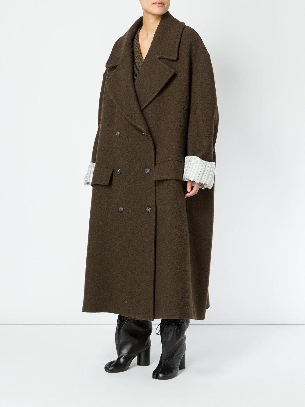 green oversized coat