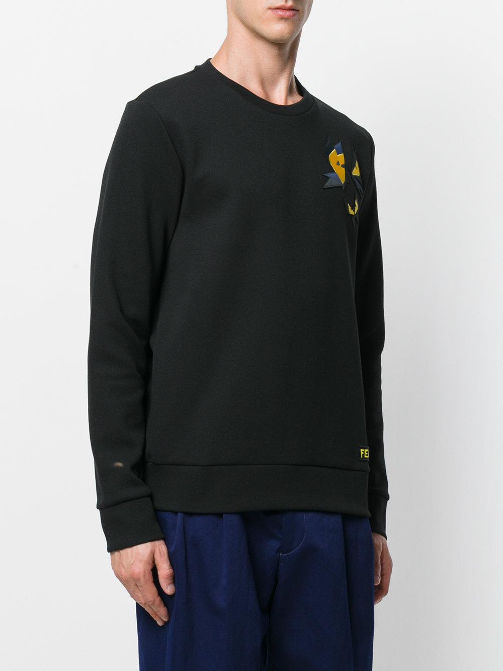 black sweatshirt with butterfly