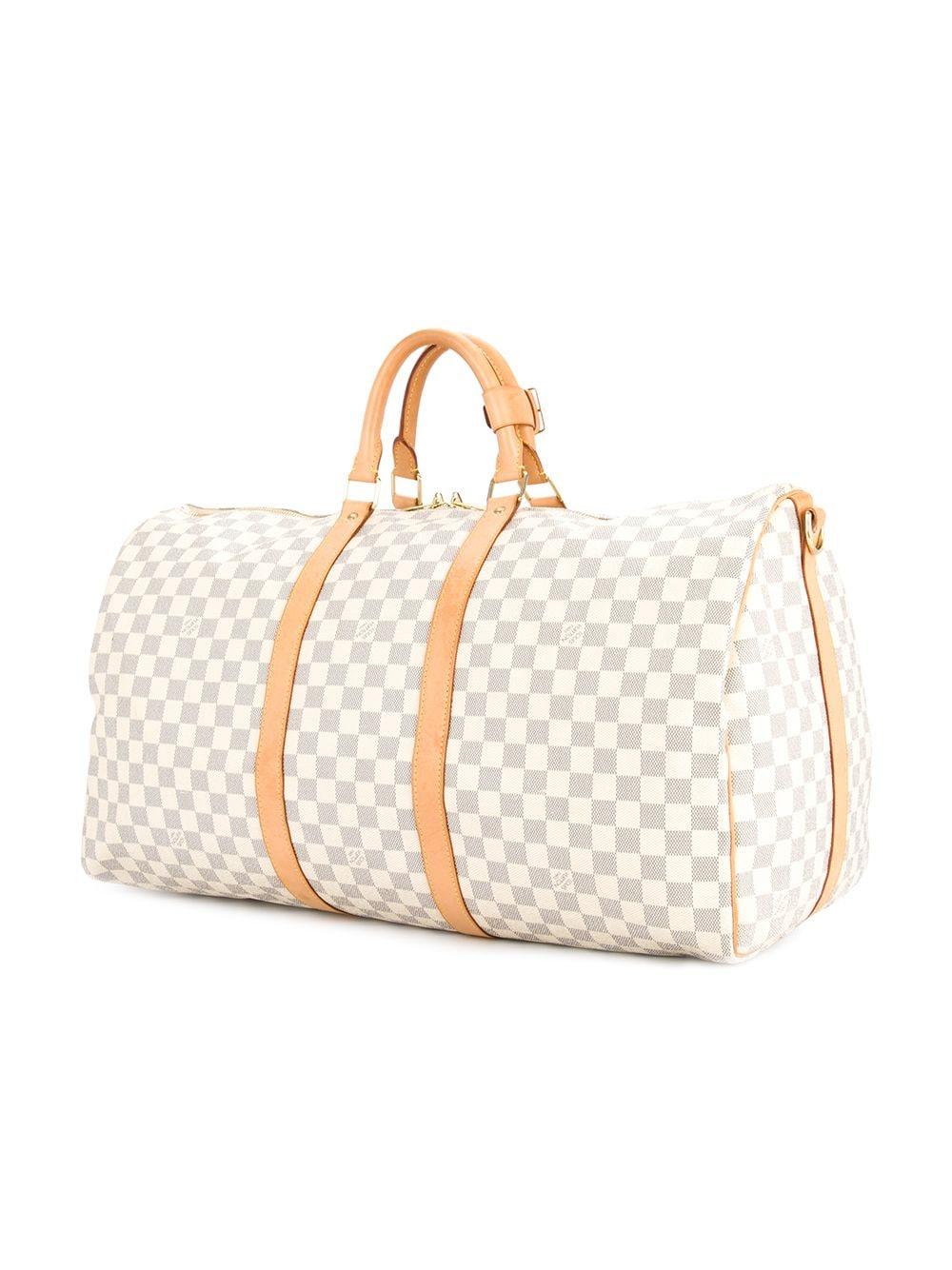 Louis Vuitton Pre-Owned Keepall Bandoulière 55 Duffle Bag in White | Lyst