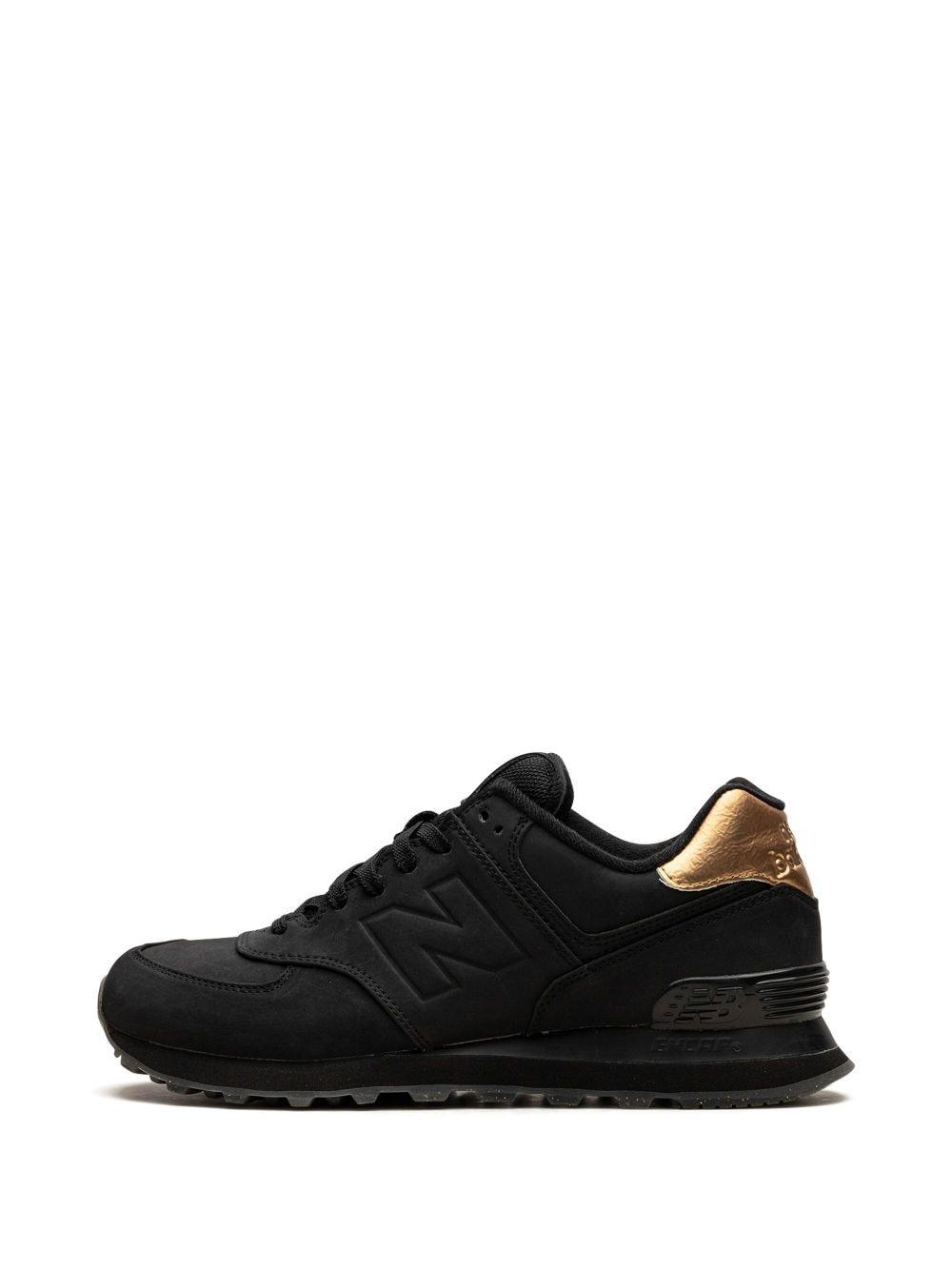 New Balance 574 "black/gold" Sneakers | Lyst