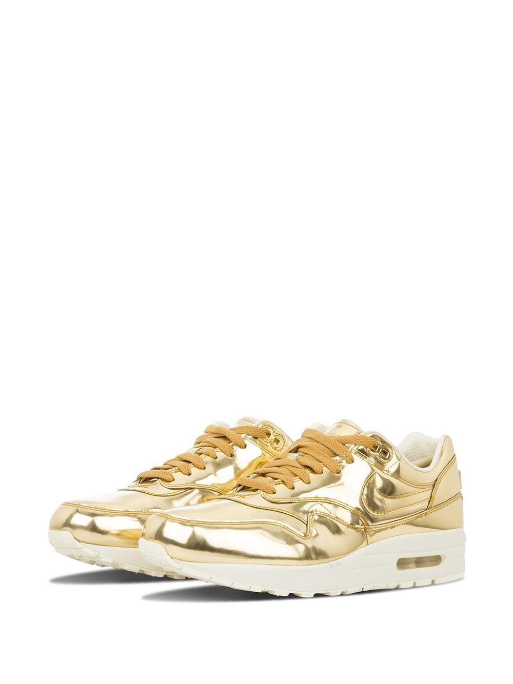 liquid gold trainers