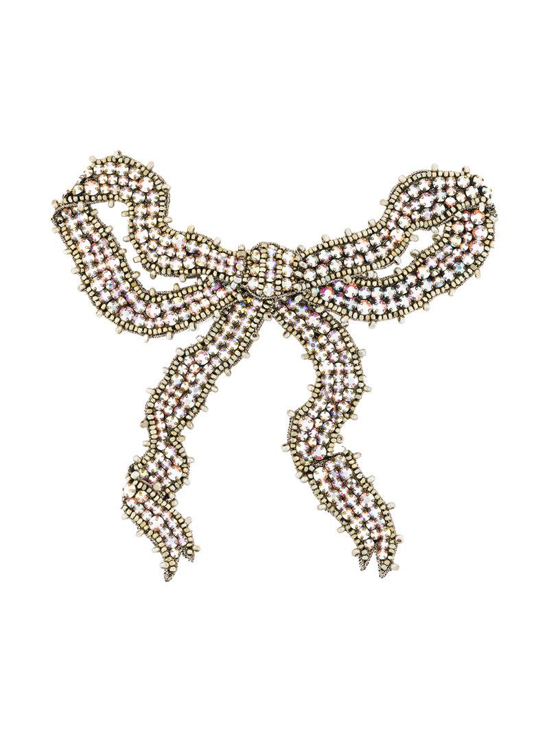 Spilla con fiocco di Gucci in Metallizzato | Lyst