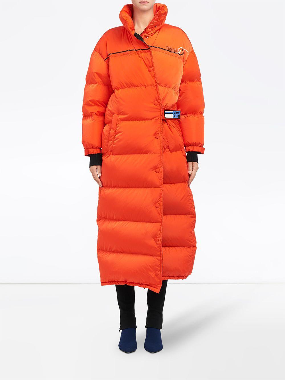 Prada Puffer Coat in Orange | Lyst