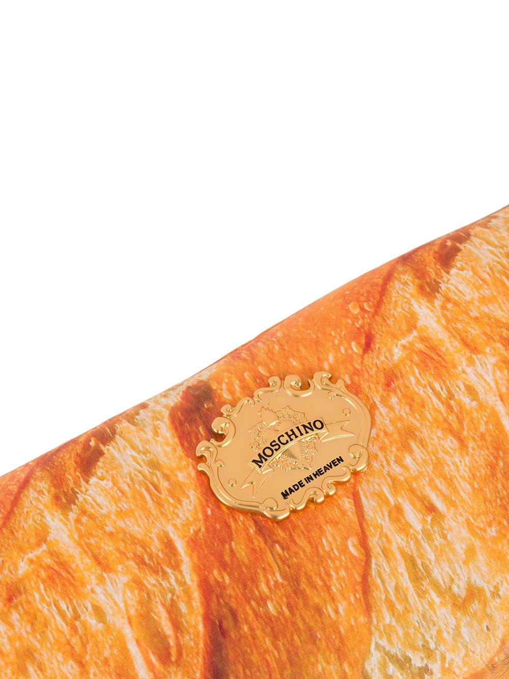 Moschino Baguette Clutch in Orange | Lyst