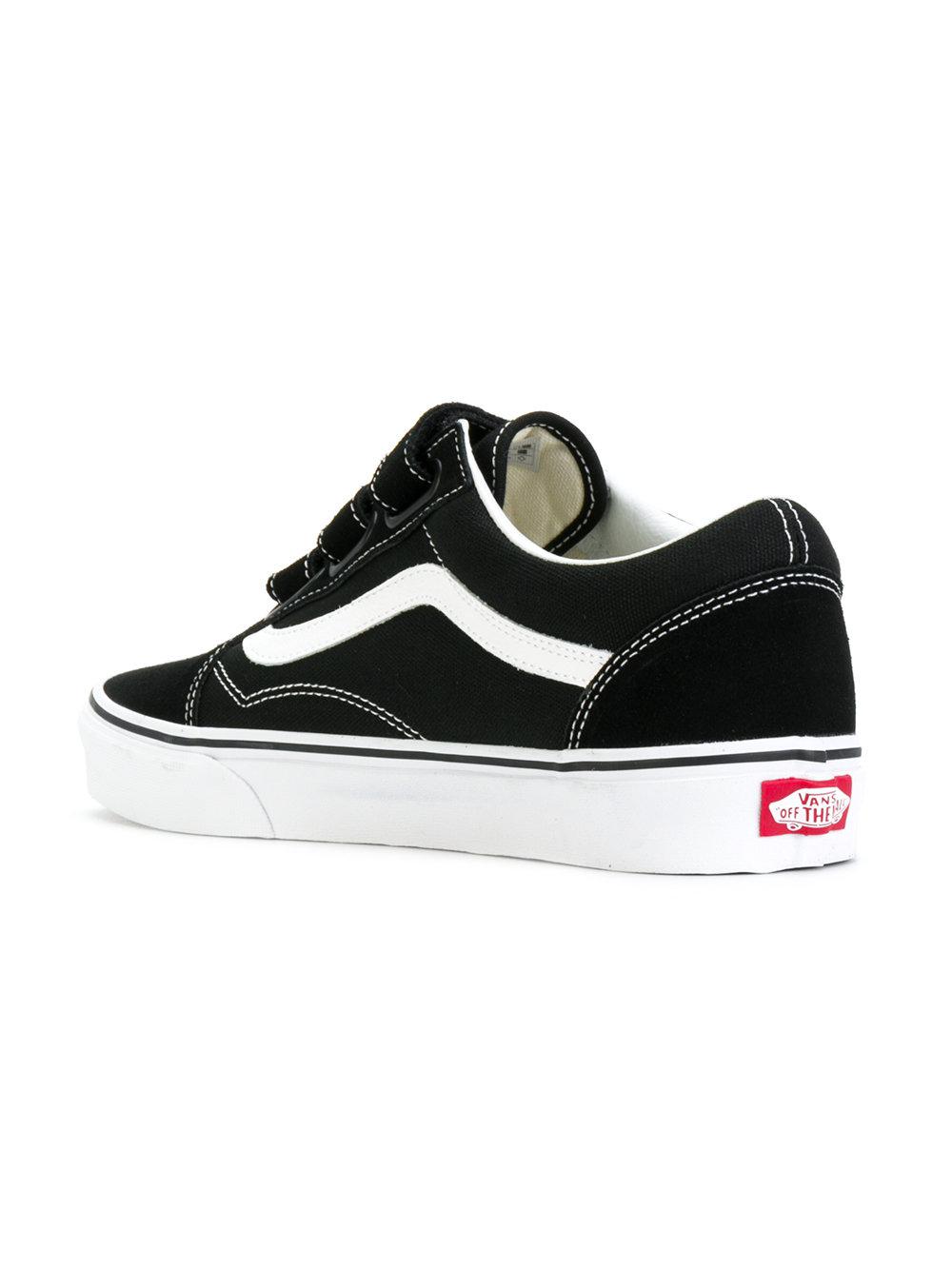 black and white vans with straps