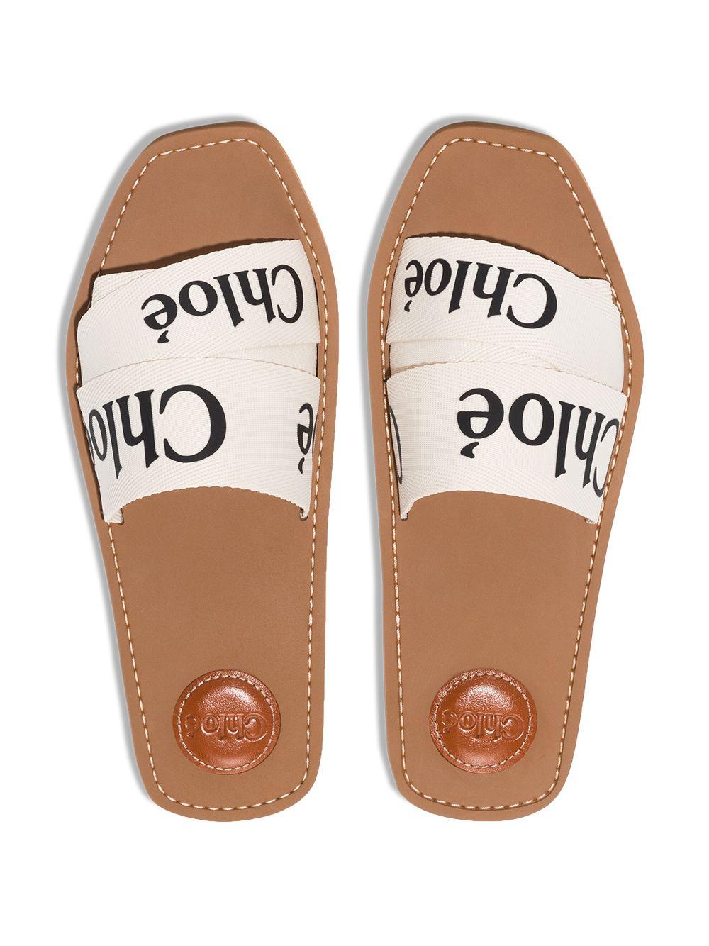 Chloé Woody Slippers Met Logo in het Wit | Lyst NL