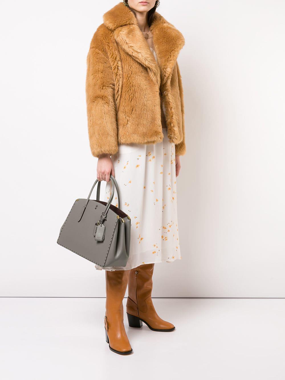 coach cooper carryall with rivets