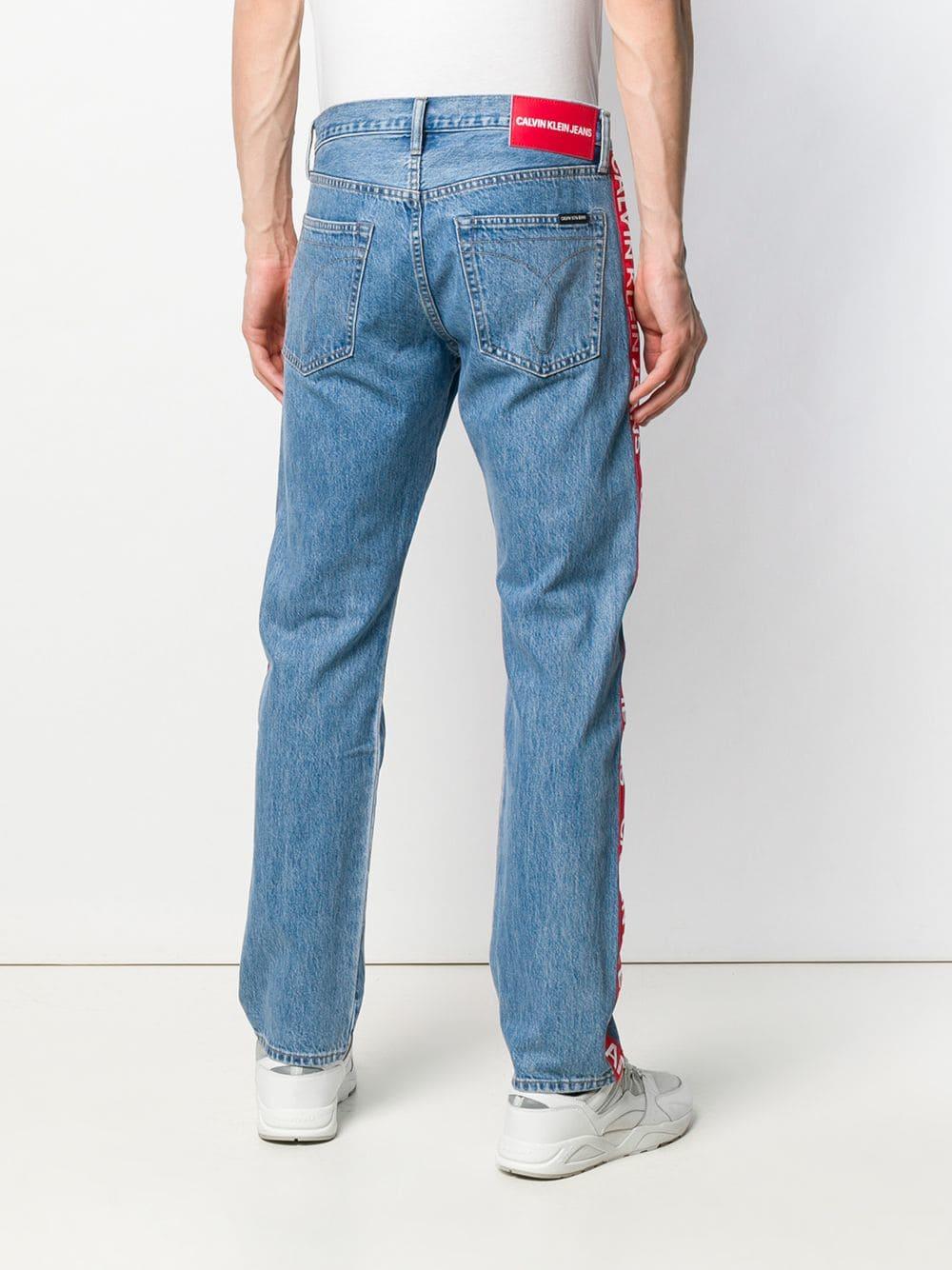 calvin klein jeans with red stripe, Off 69%, www.yesilkoyvet.com