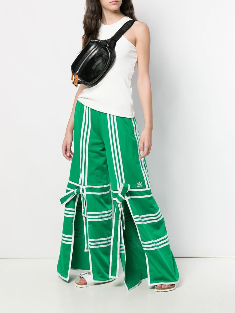 adidas Flared Track Pants in Green | Lyst