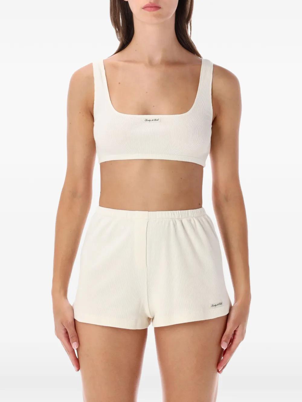 Sporty & Rich Sleeveless and tank tops for Women | Online Sale up
