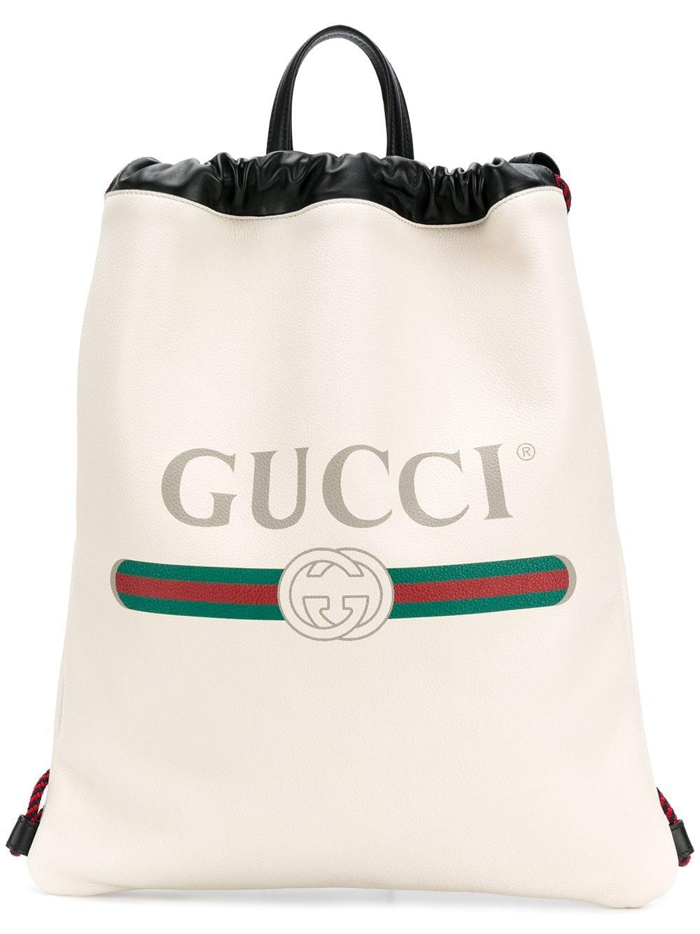 Gucci Leather Logo Print Drawstring Backpack in White - Save 9% - Lyst