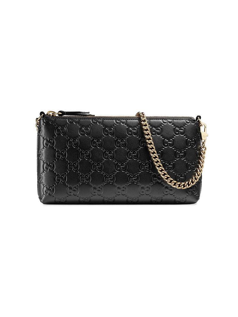 Gucci Leather Signature Wrist Wallet in Black - Lyst