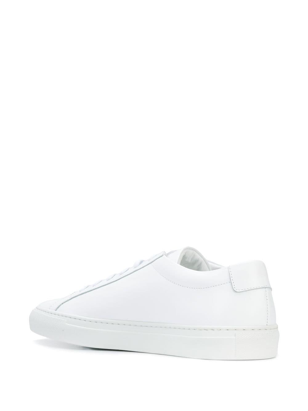 white sneakers common projects
