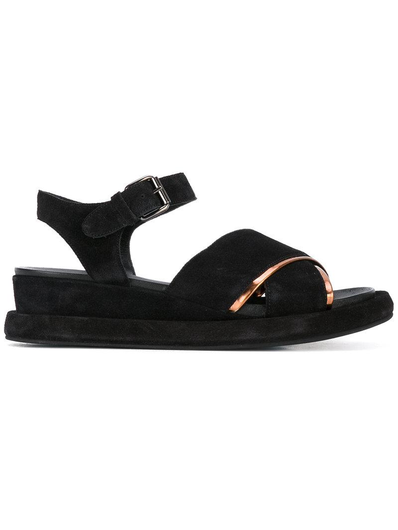 black flat crossover sandals