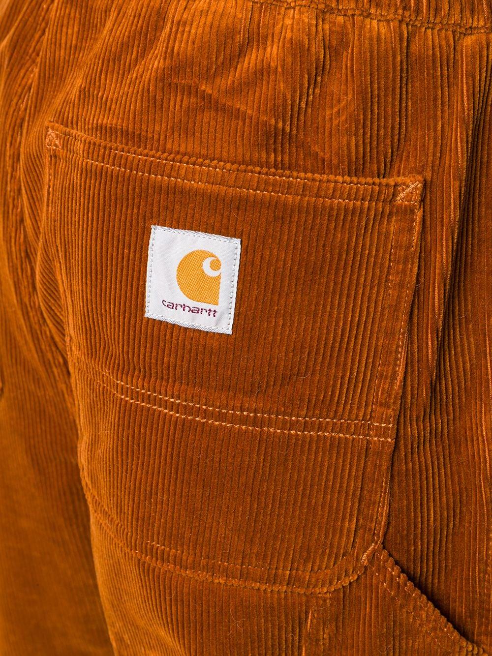 Carhartt WIP Elasticated Corduroy Trousers in Orange for Men | Lyst