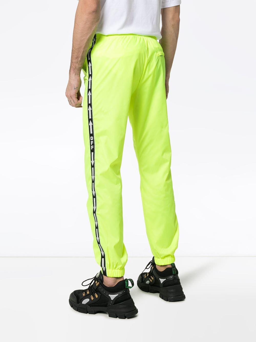 off white pants with yellow stripe