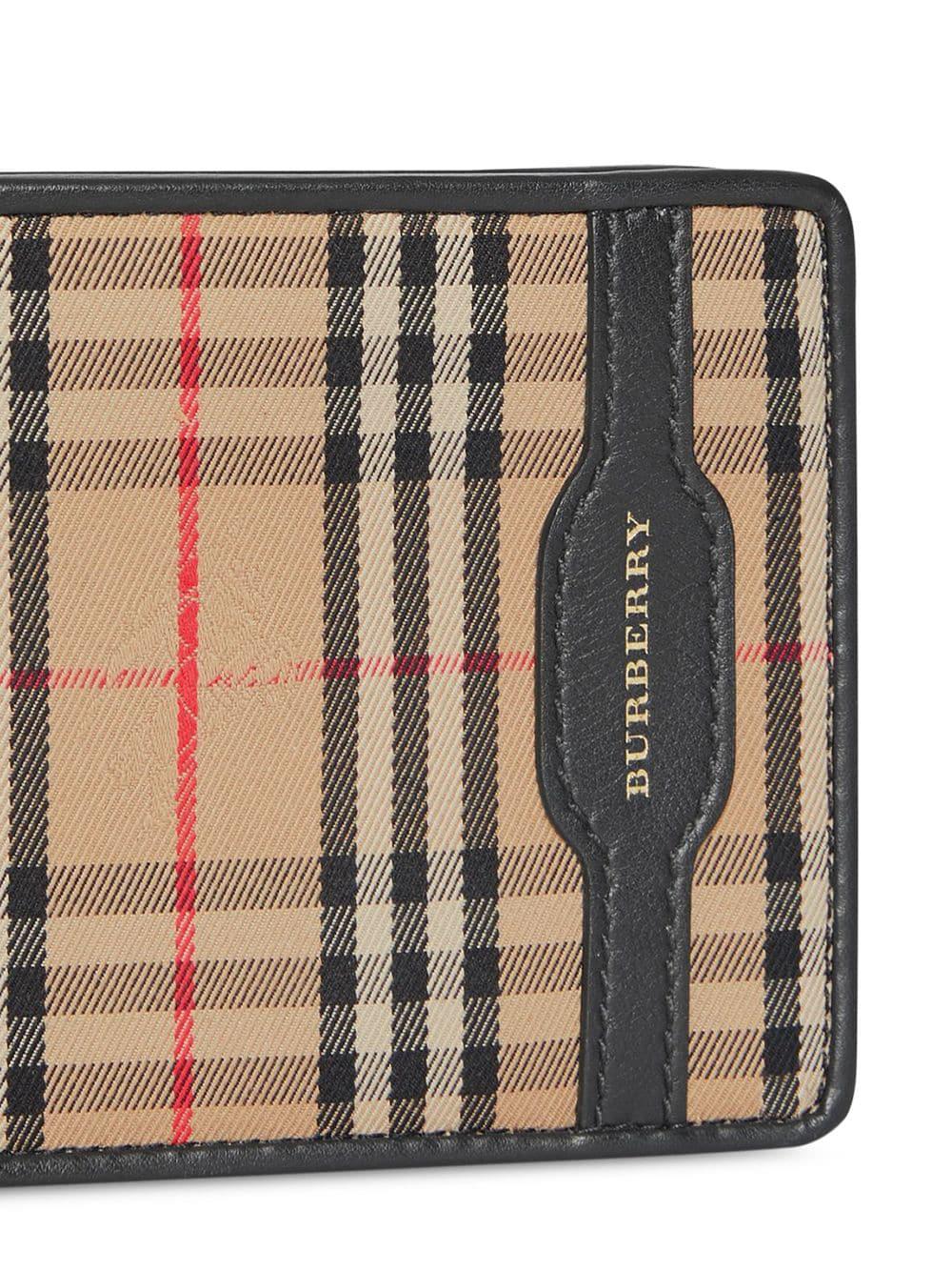 1983 check and leather international bifold wallet