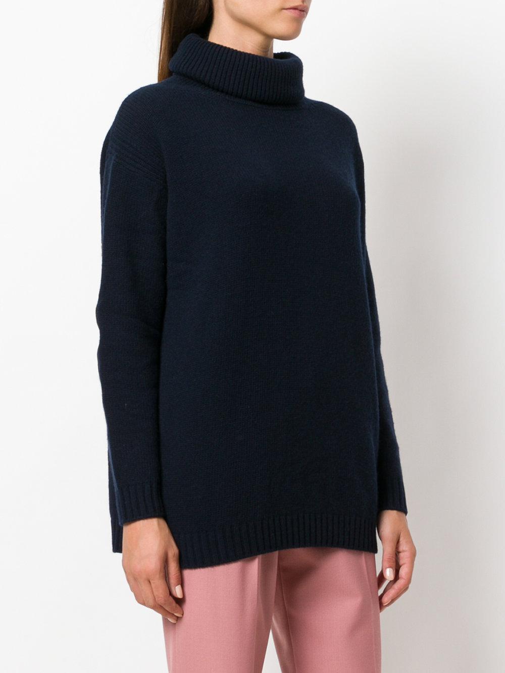 Blue roll neck jumper Knitted fabric Roll neck Long sleeve Cuffed trims Our model wears a UK 8 and is cm/5'9'' tall.