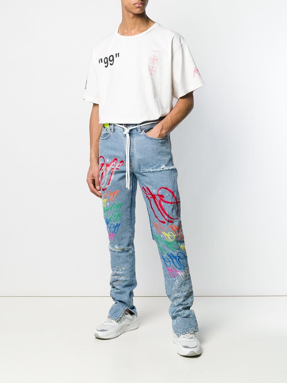 distressed graffiti jeans