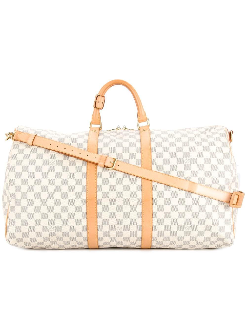 Louis Vuitton Pre-Owned Keepall Bandoulière 55 Duffle Bag in White | Lyst  Canada