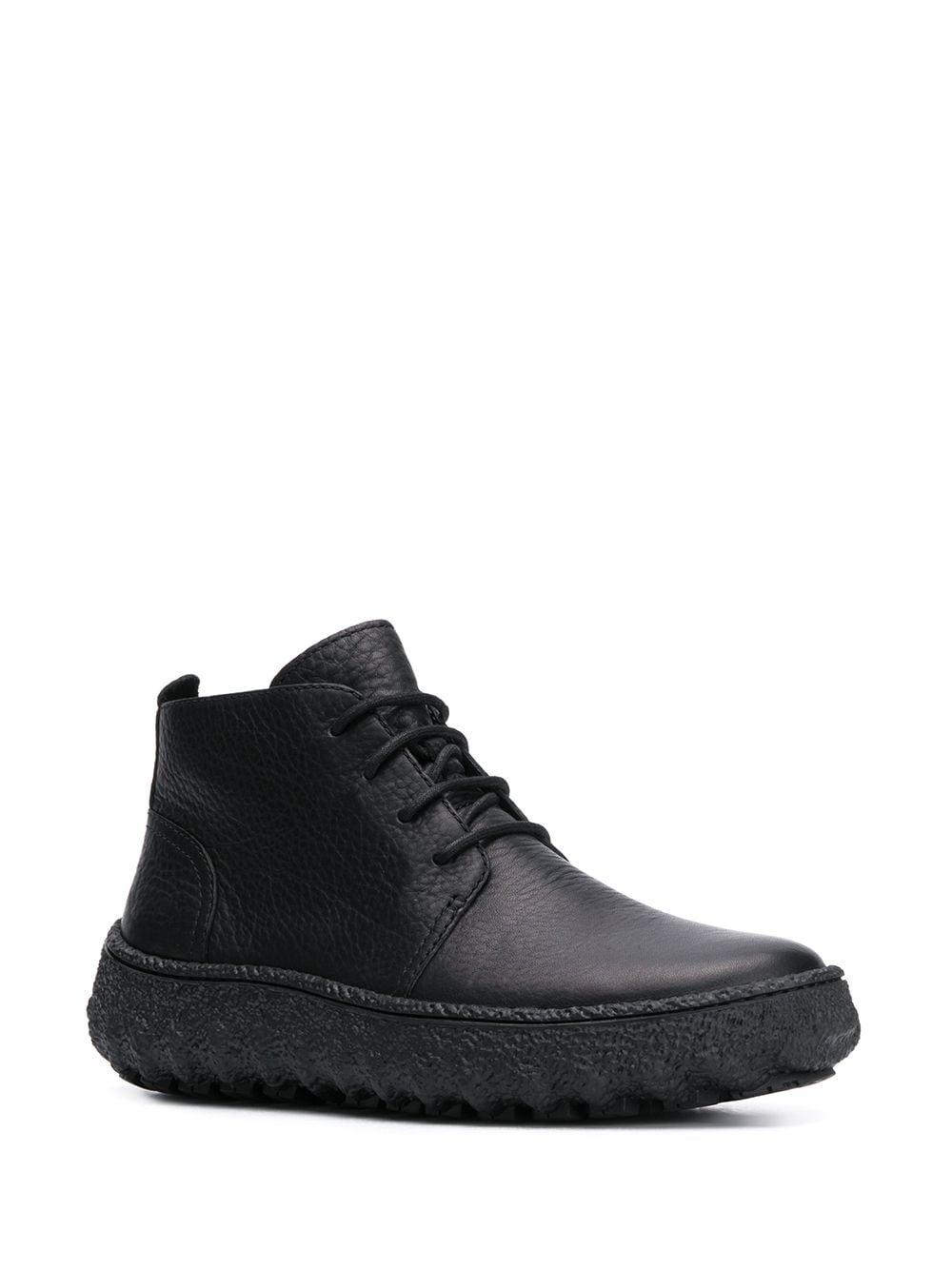 camper black boots