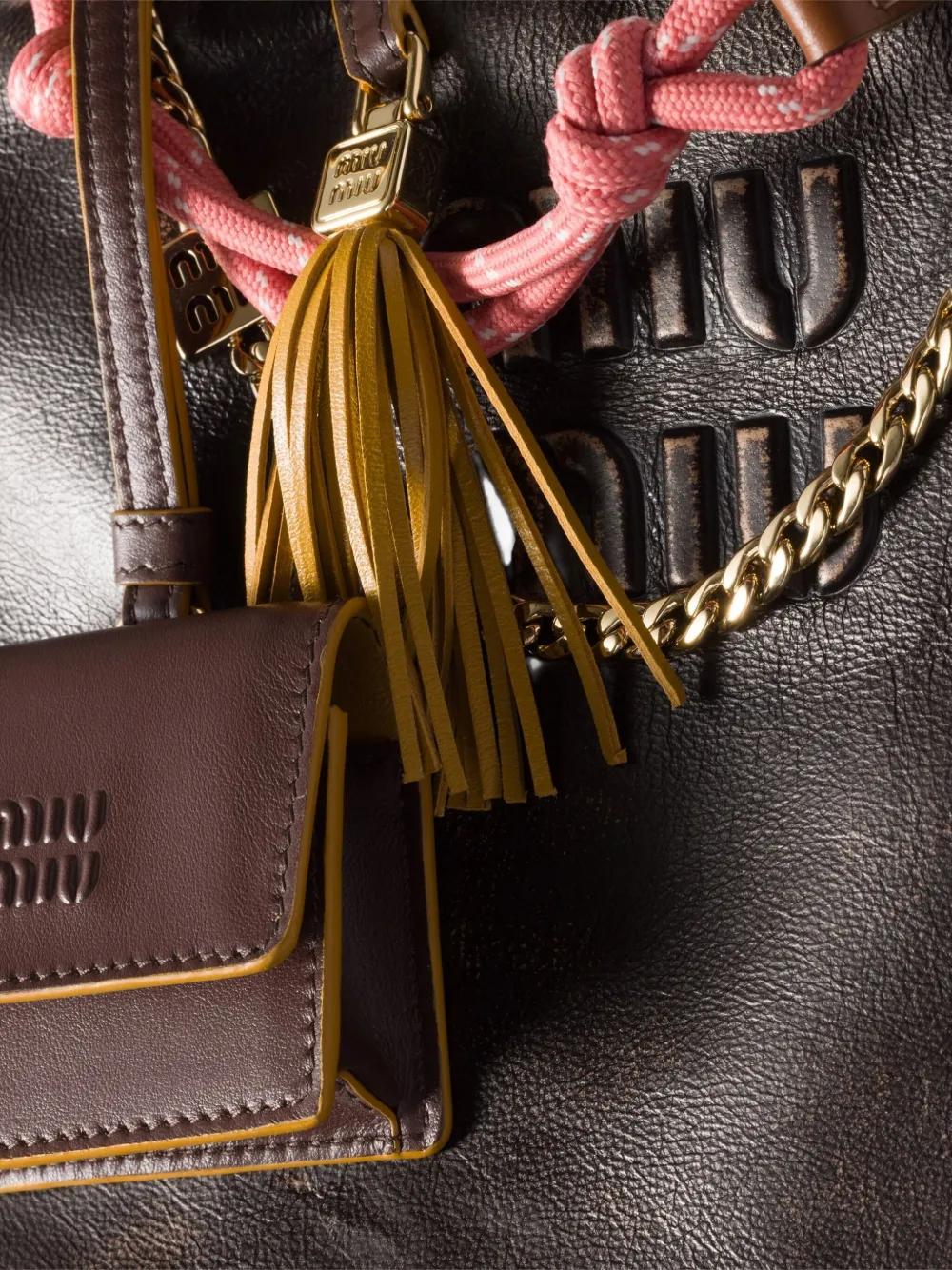 MIUMIU トリックキーリング ブラウン Miu Miu Leather, Cord And Metal Trick Keyring in Pink | Lyst
