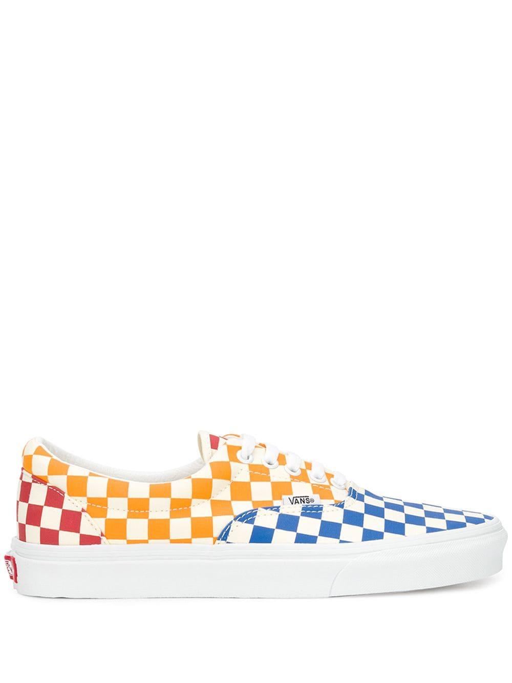 orange checkered slip on vans