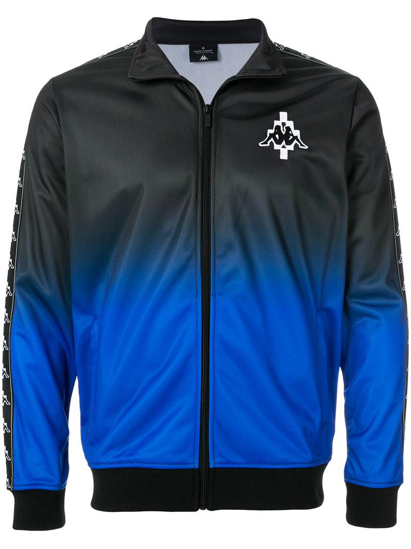 blue and black kappa tracksuit