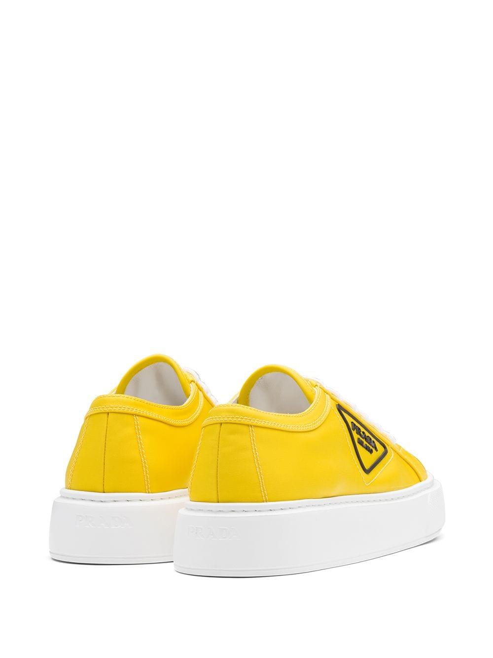 prada yellow and black sneakers