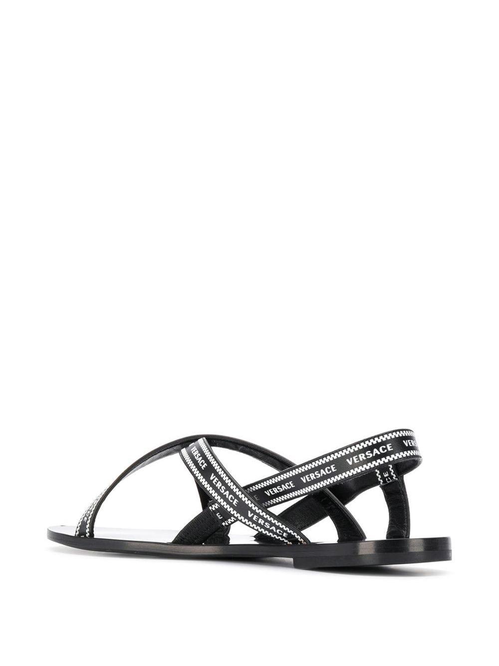 Versace Leather Logo Strap Sandals in Black - Lyst