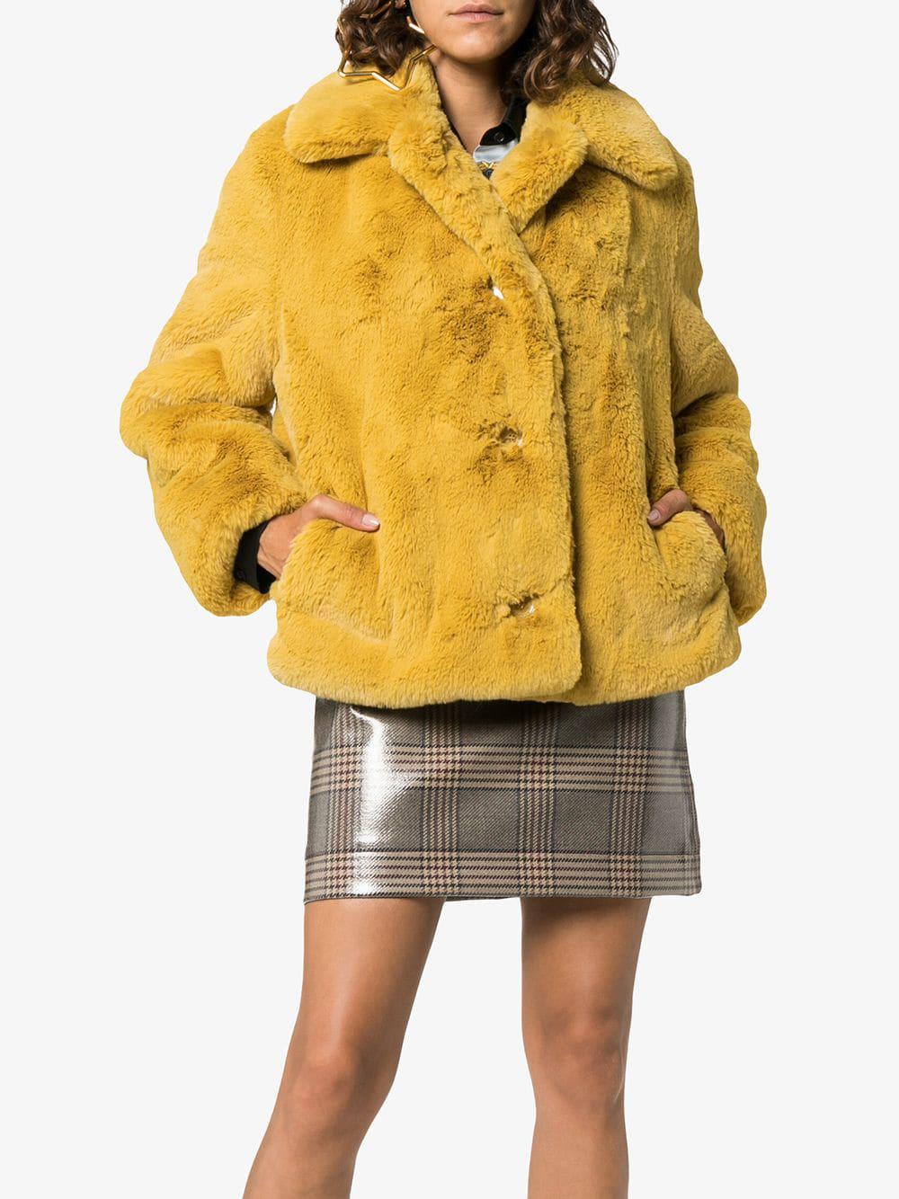 long ochre faux fur coat