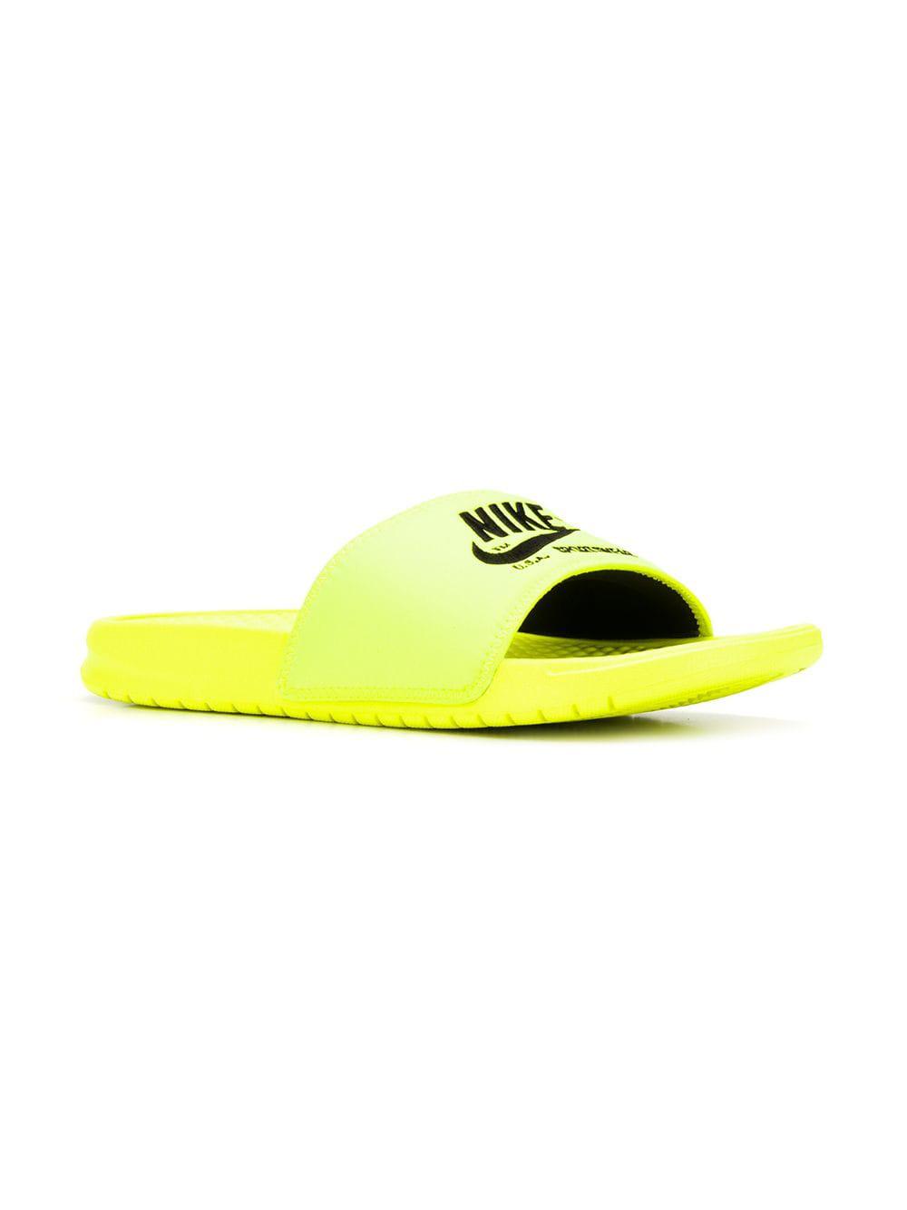 Nike Benassi Slide Sandals in Yellow 