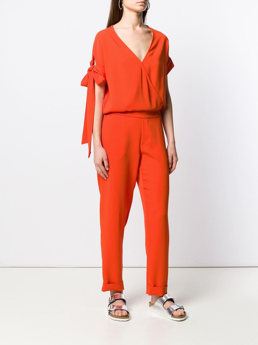 orange formal jumpsuit