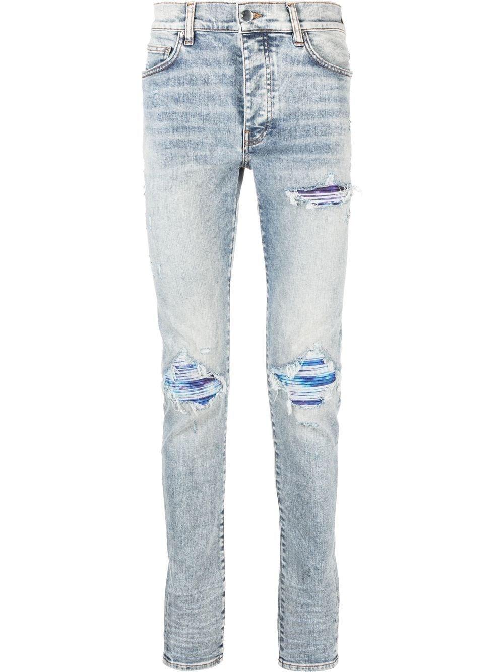 Amiri Light-wash Ripped Skinny Jeans in Blue for Men | Lyst