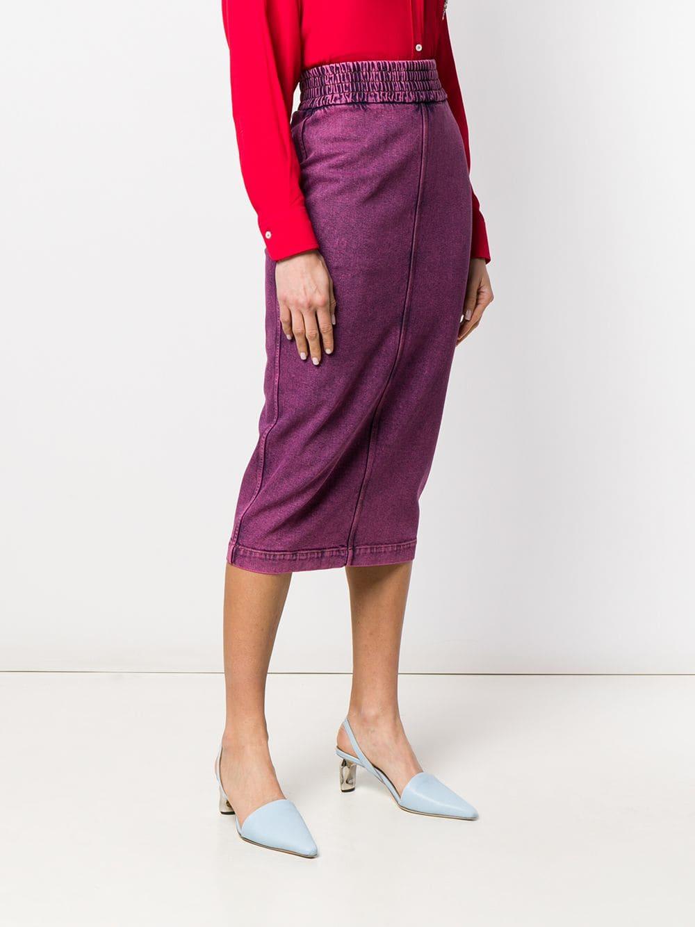 white skirt with buttons in the front