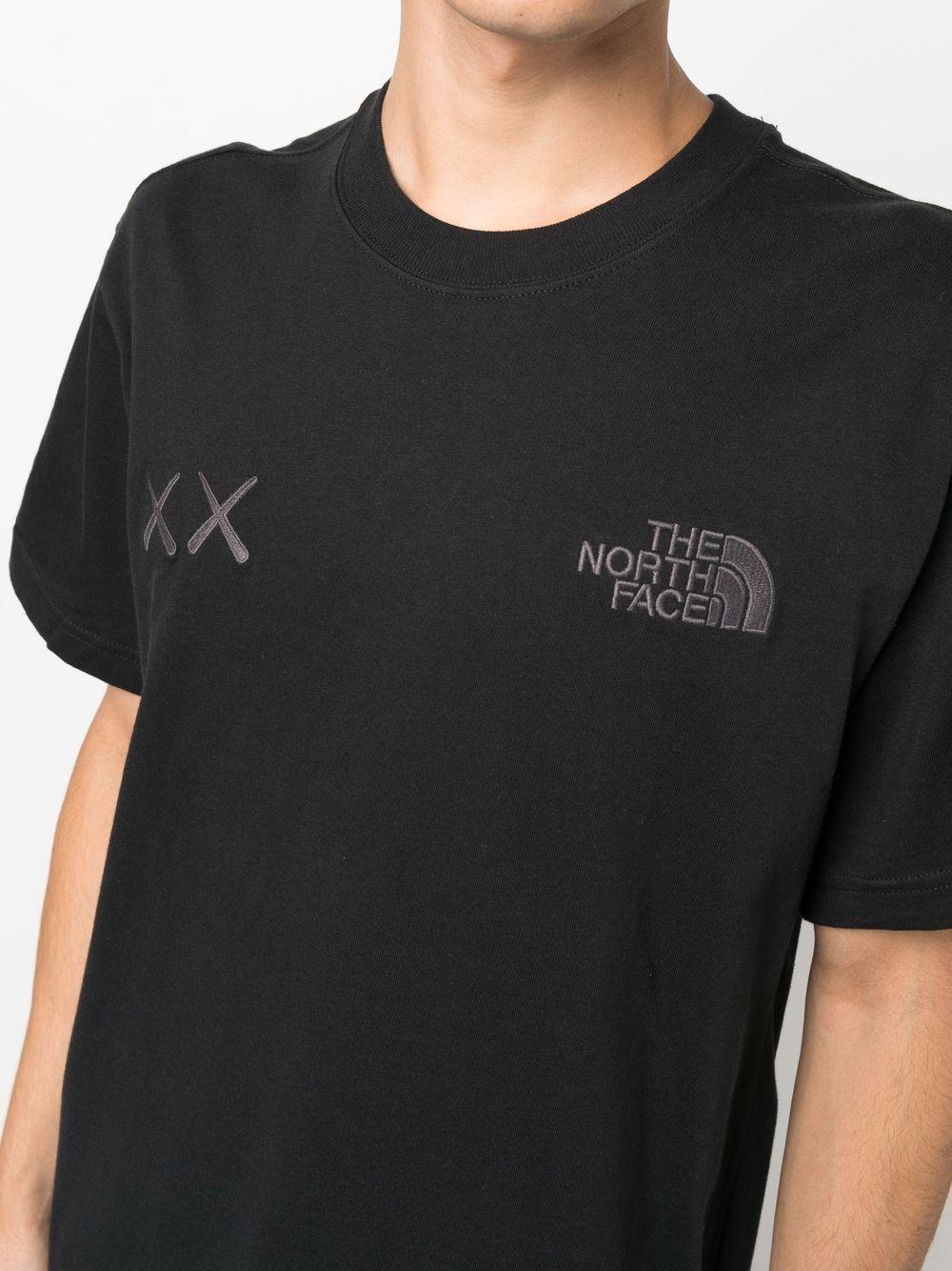 The North Face X Kaws Logo Print Cotton T-shirt in Black for The North Face X Kaws Logo Print Cotton T-shirt in Black for