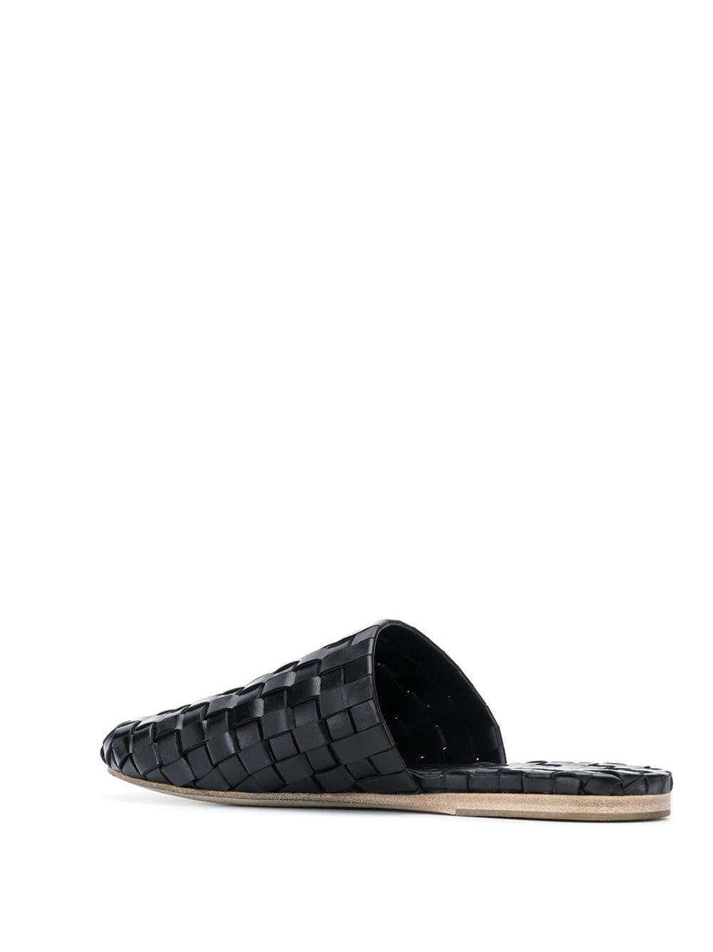 black woven mules