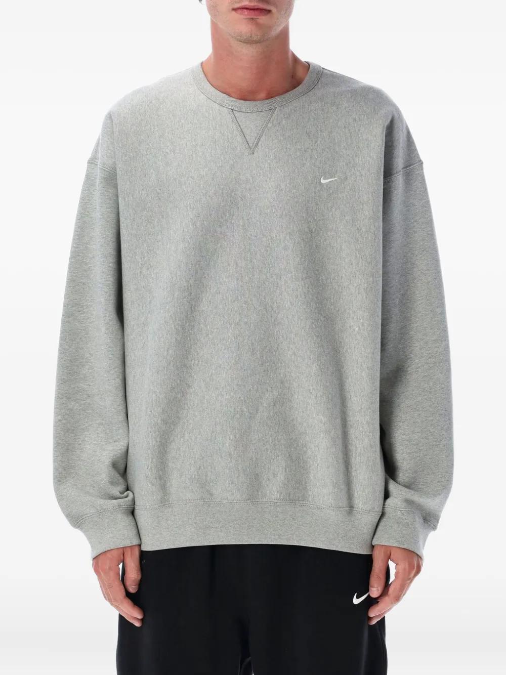 nike swoosh crew neck