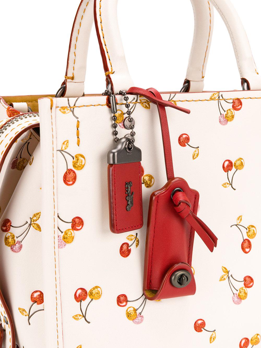 coach purse with cherries